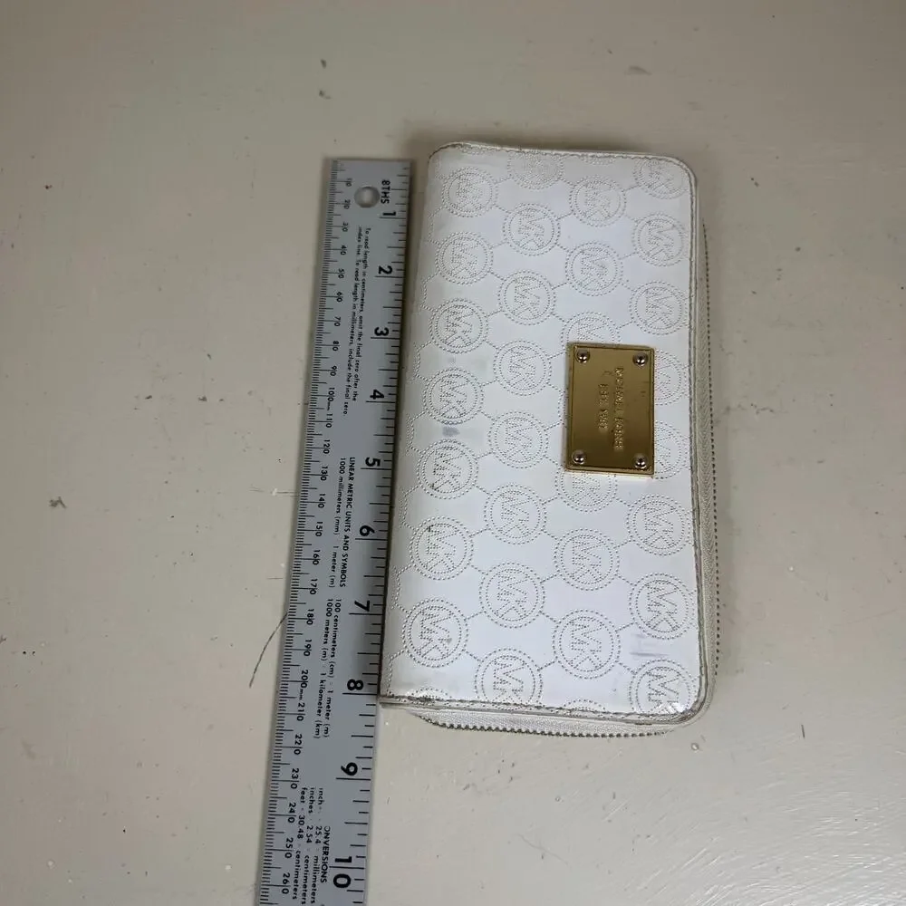 Michael Kors Contential MK Mono Mirror White Metallic zip around long wallet